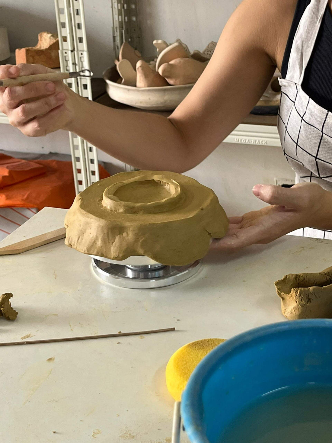 Pottery hand building class at RAAQUU