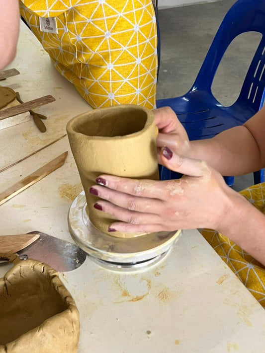 Pottery throwing at RAAQUU